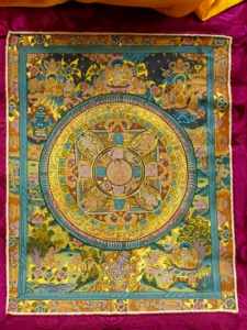 Thangka rappresentante un Mandala con la vita del Buddha